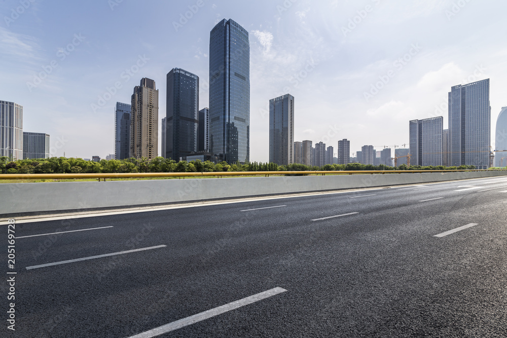 Empty Road with modern business office building 