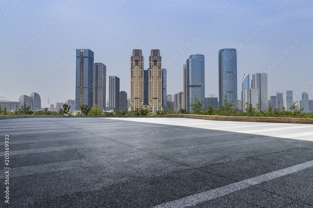 Empty Road with modern business office building Empty Road with modern business office building