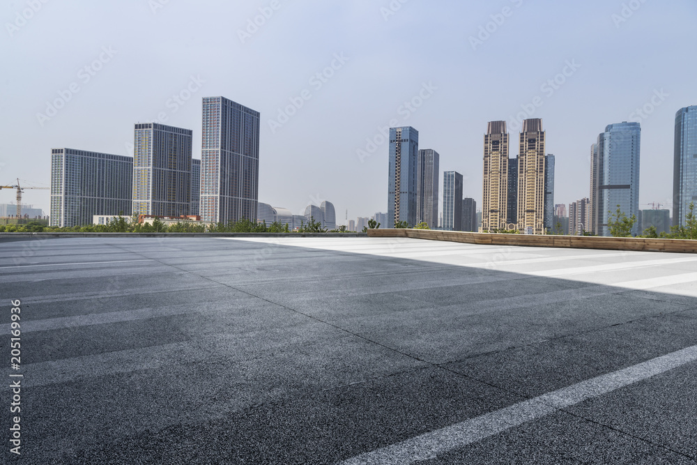 Empty Road with modern business office building Empty Road with modern business office building