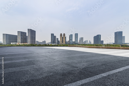 Empty Road with modern business office building 