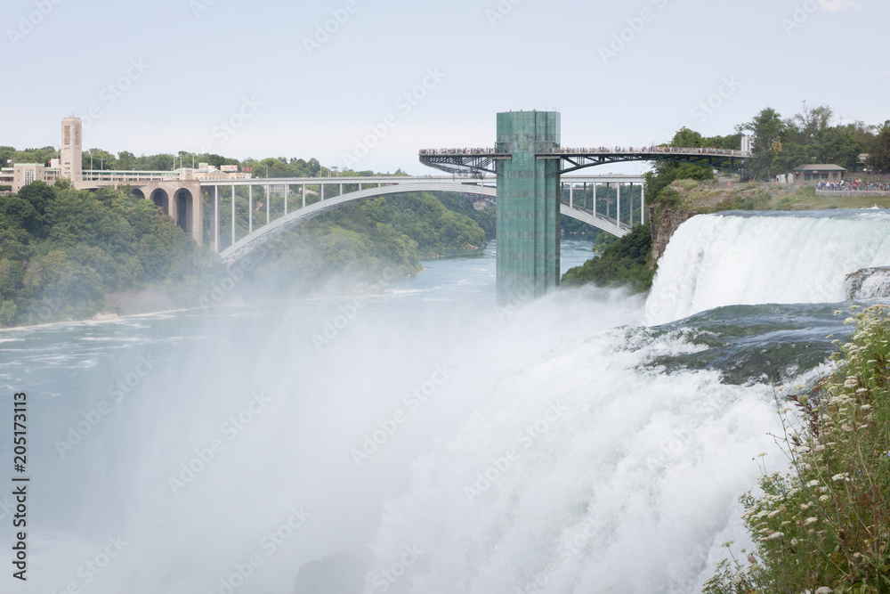 Niagara waterfall cascade in cloudy weather Niagara waterfall cascade in cloudy weather