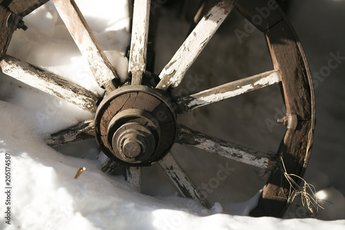 wooden wheel of an old cart
