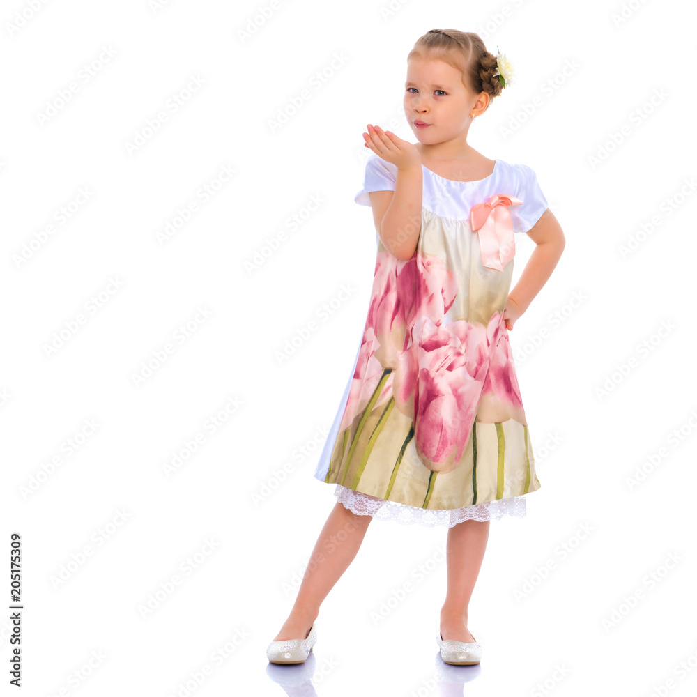 Little girl blowing on the palm Little girl blowing on the palm