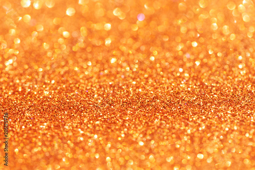 orange glitter lights background. defocused.