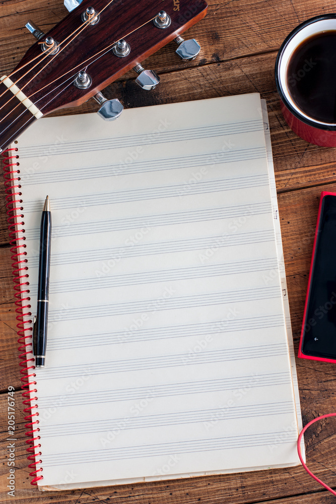 Guitar, coffee, smartphone and a clean note-book on a wooden table, top  view, copy space foto de Stock | Adobe Stock