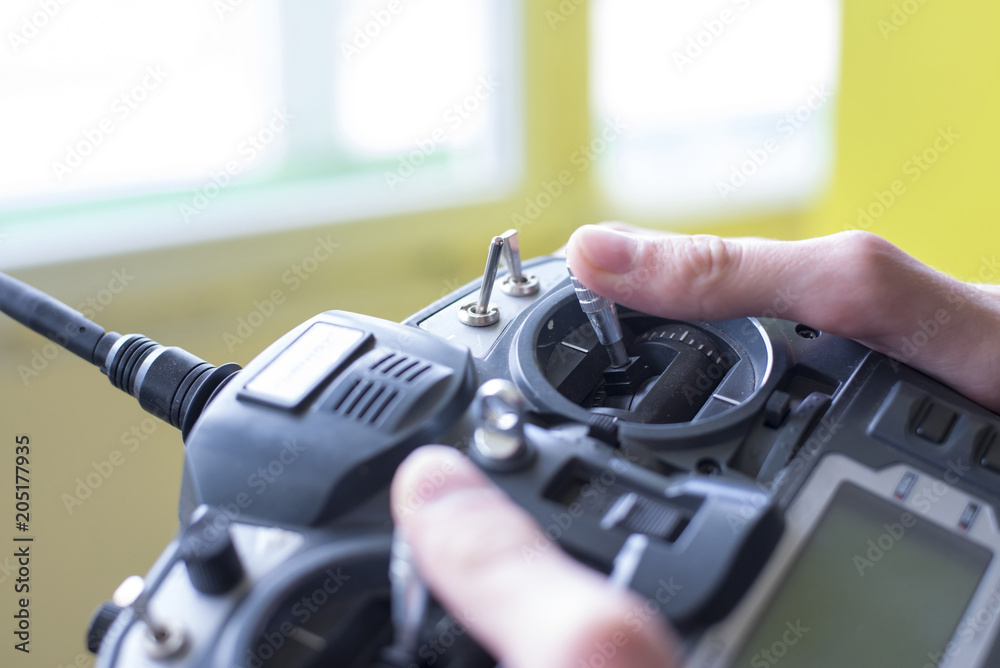 Large radio remote control in the boy's hand Large radio remote control in the boy's hand