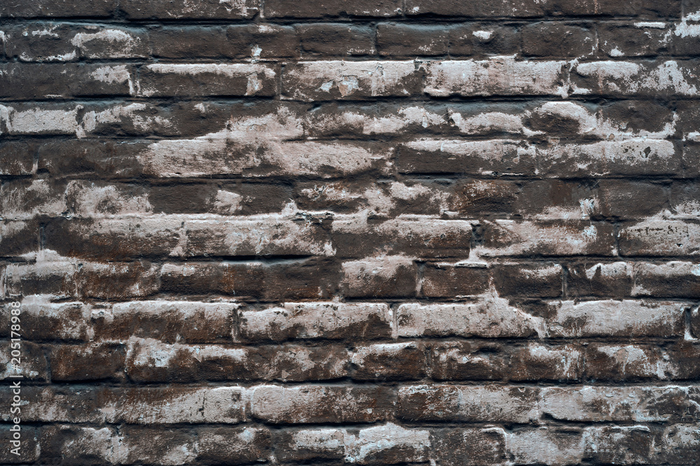 background of bricks under a thin layer of painted faded putty background of bricks under a thin layer of painted faded putty