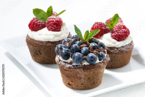 sweet chocolate cupcakes with fresh berries