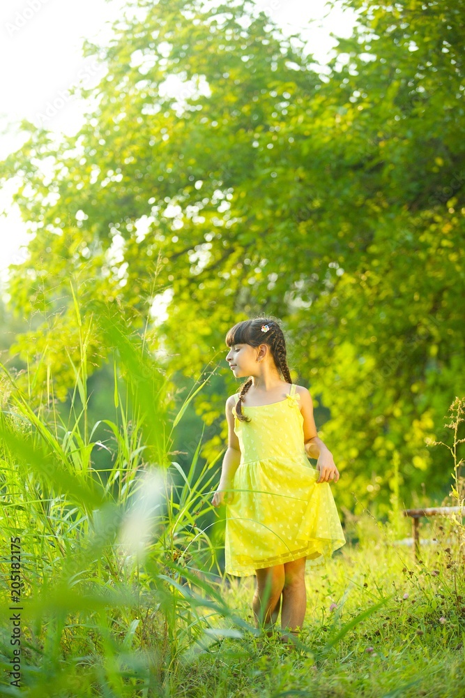 Baby girl in bright yellow dress Baby girl in bright yellow dress