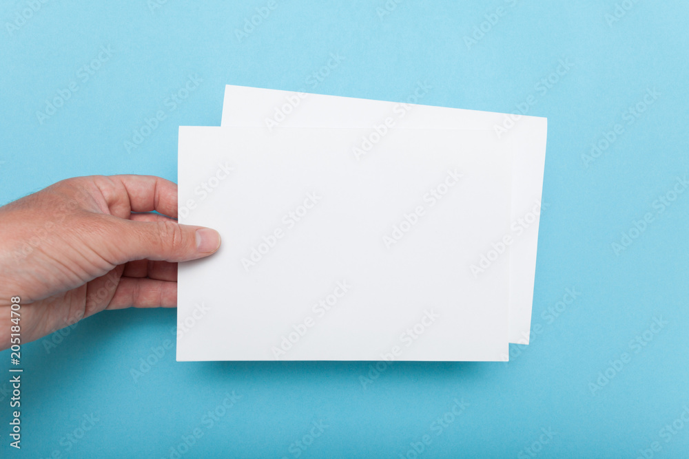 A5 Flyer mockup in hand, paper blank template brochure. A5 Flyer mockup in hand, paper blank template brochure.