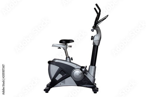 Upright bike for exercise in gym or fitness isolated on white background with clipping path.