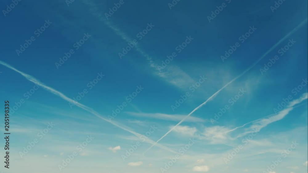 Beautiful cloudscape with Jet or airplane Condensation traces, 4K time lapse video Beautiful cloudscape with Jet or airplane Condensation traces, 4K time lapse video