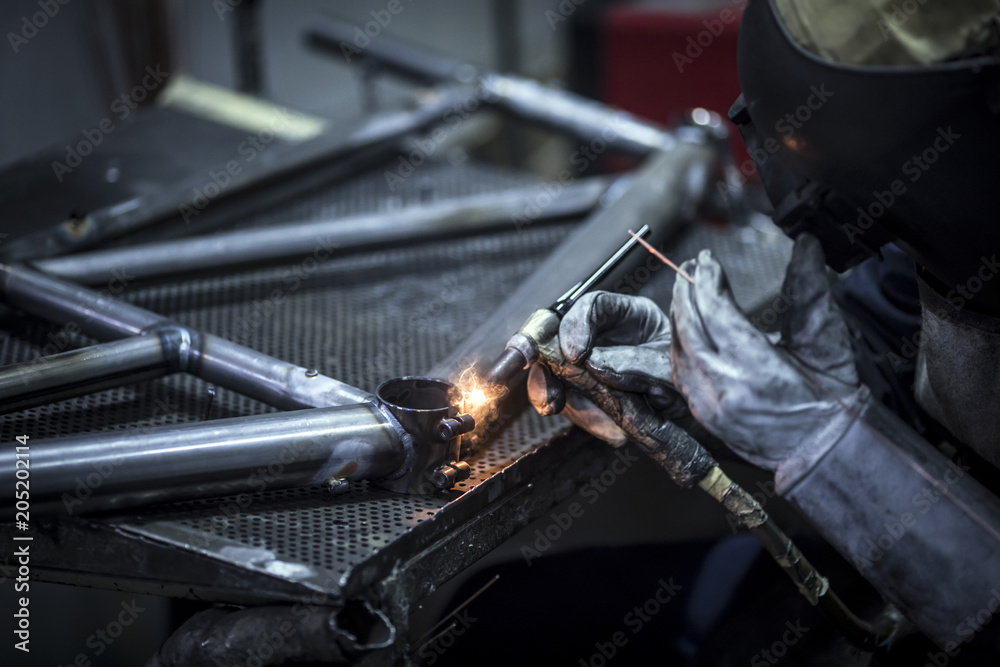 Welding At Bicycle FActory - obrazy, fototapety, plakaty 