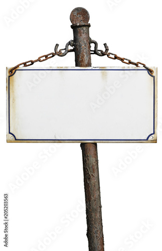 Old metal sign hanging on rusty pole isolated on white background