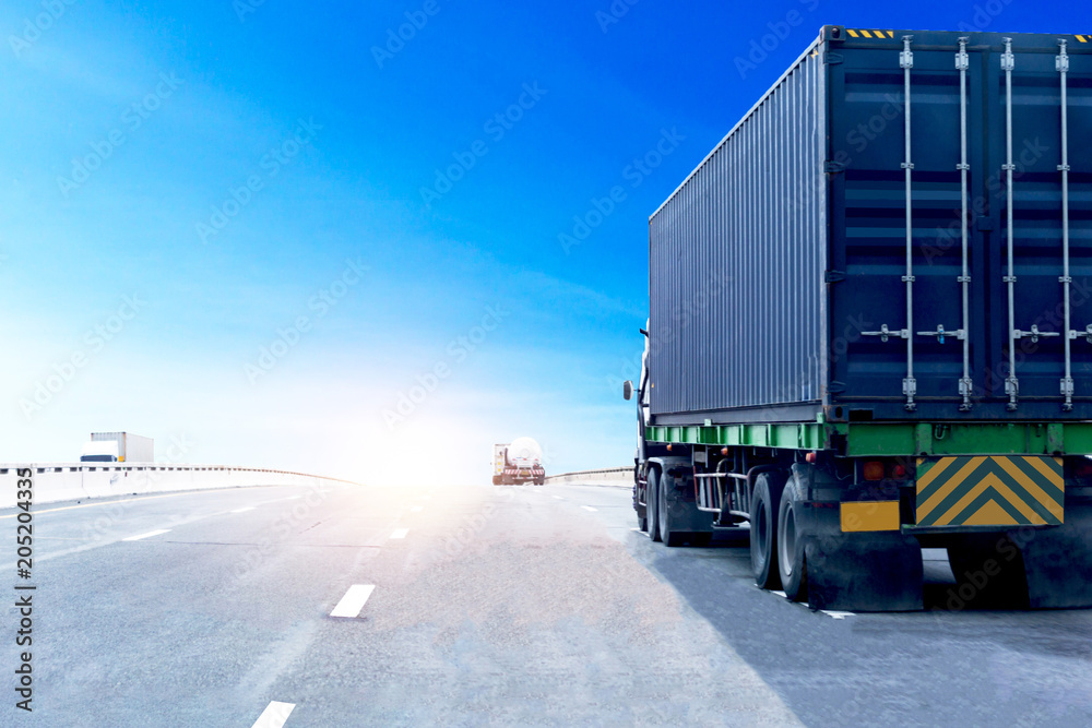 Truck on highway road with blue container, transportation concept.,import,export logistic industrial Transporting Land transport on the asphalt expressway with blue sky