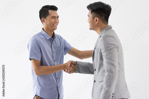Asian Young Business shake hand