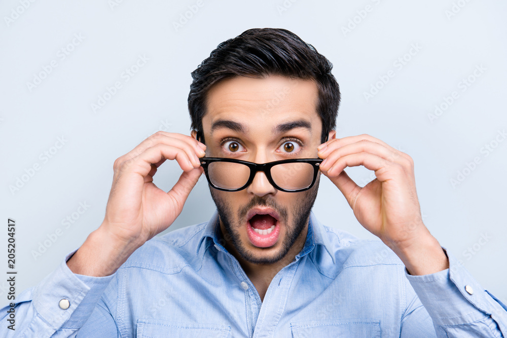 Omg. Half profile shot of pop-eyed funny young black man looking