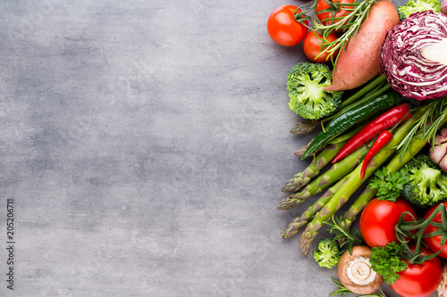 Flat lay of various colorful raw vegetables.