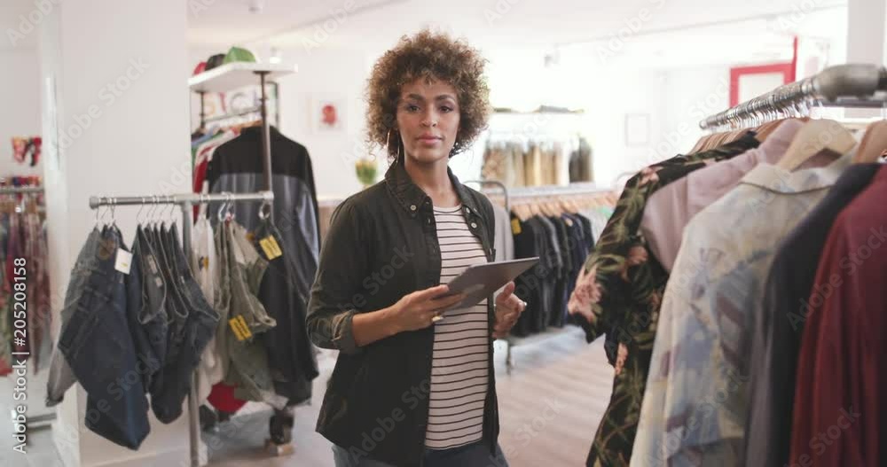 Portrait of a store manager in clothing store
