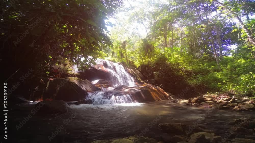 Sunny tropical waterfall. Thailand, Phuket. Video with natural sound Sunny tropical waterfall. Thailand, Phuket. Video with natural sound