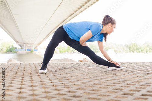 Fitness Woman doing workout outdoor