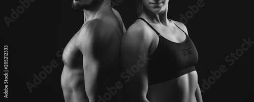 Fitness workout couple with perfect upper bodies
