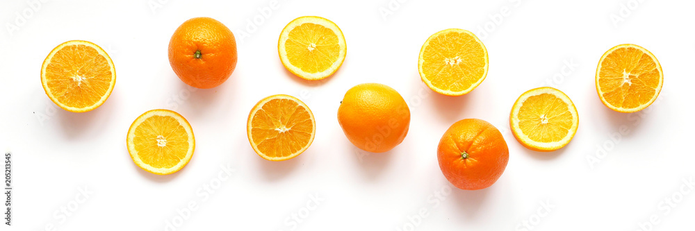 Creative flat layout of fruit, top view. Sliced orange isolated on white background. Creative flat layout of fruit, top view. Sliced orange isolated on white background.