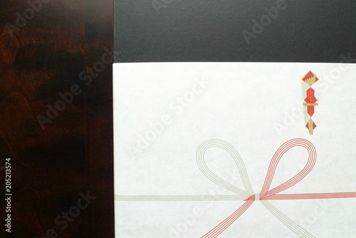 贈り物・のし紙・木製テーブル - Japanese formal giftwrapping - noshi paper - on wooden table photo