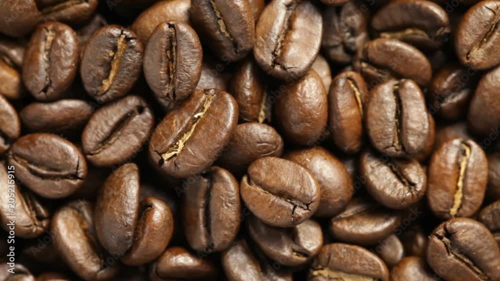 Close up of rotating Coffee Beans. No sound. Close up of rotating Coffee Beans. No sound.