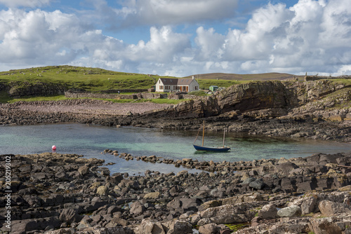 Farmhouse and boat, Clachtoll, Assynt, Scotland, United Kingdom photo