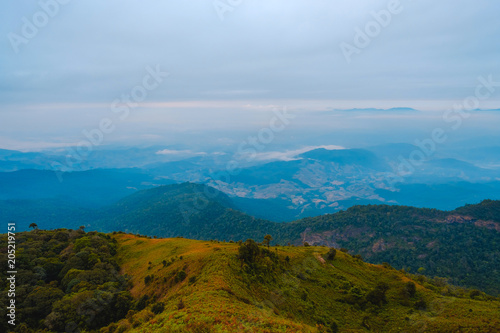 high mountains peaks range clouds in fog scenery landscape national park view outdoor  at Chiang Rai, Chiang Mai Province, Thailand © Tony