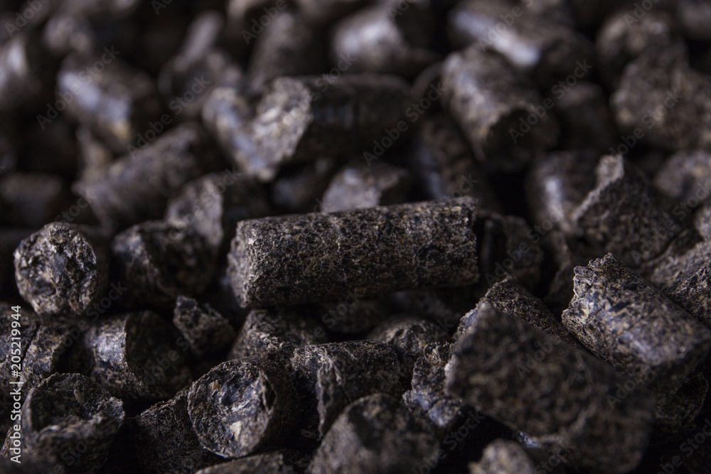 Pellets - new environmentally friendly fuel, close-up Pellets - new environmentally friendly fuel, close-up