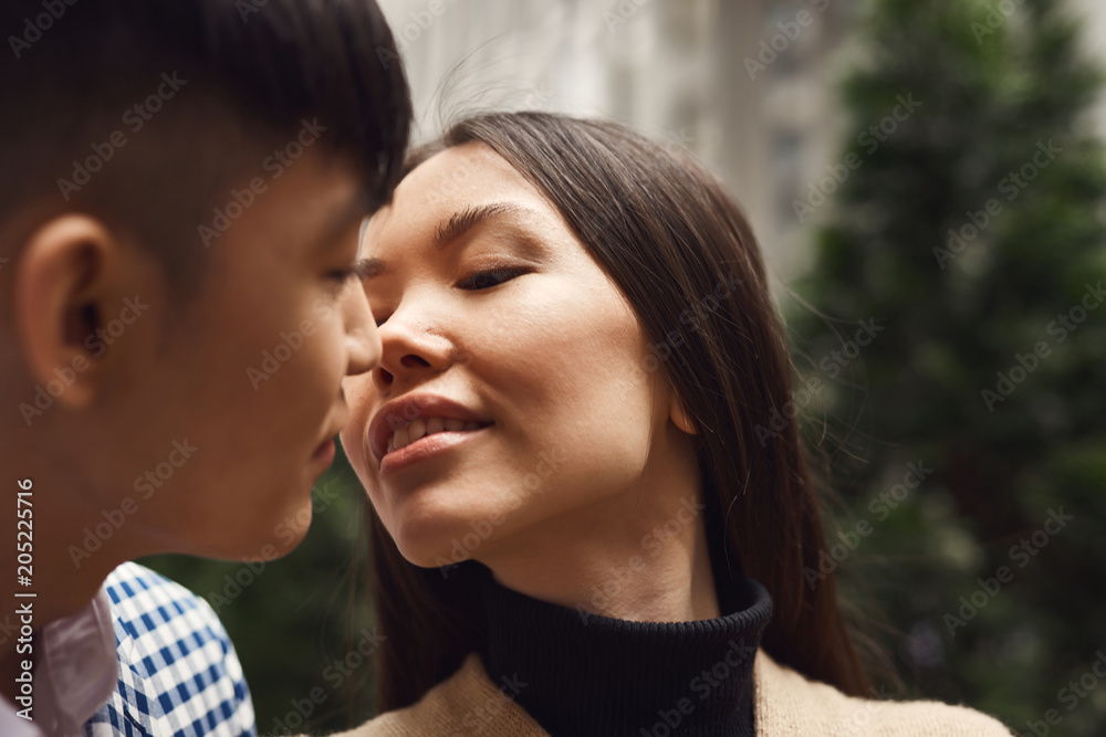 Fototapeta premium Girl in love looks at guy.