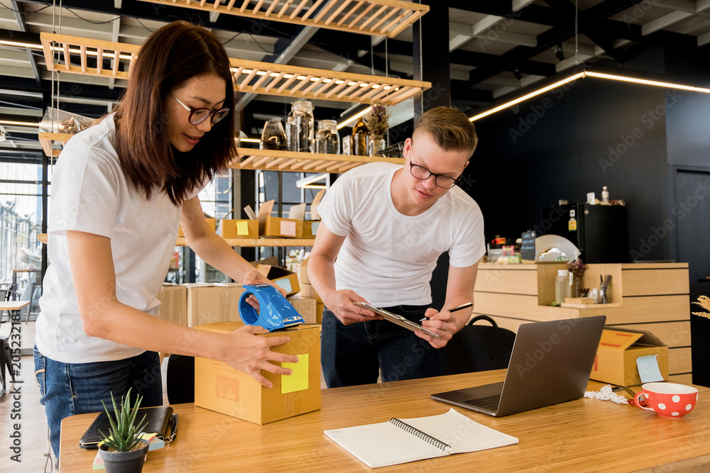 happy people working with laptop for check stock product business online office in home, online business happy people working with laptop for check stock product business online office in home, online business