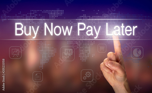 A hand selecting a Buy Now Pay Later business concept on a clear screen with a colorful blurred background.