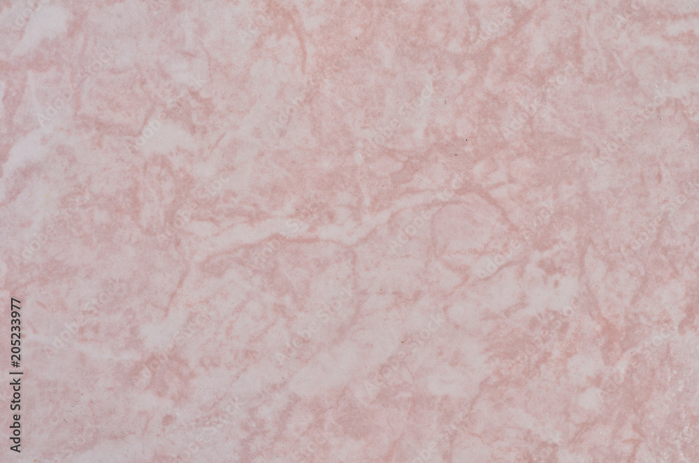 A tile, a pattern on a pink ceramic tile, a texture. A tile, a pattern on a pink ceramic tile, a texture.