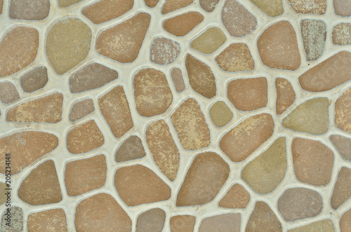 Stone is a ceramic tile with a round stone pattern.