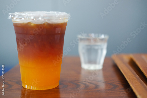 Glass of coffee with orange soda