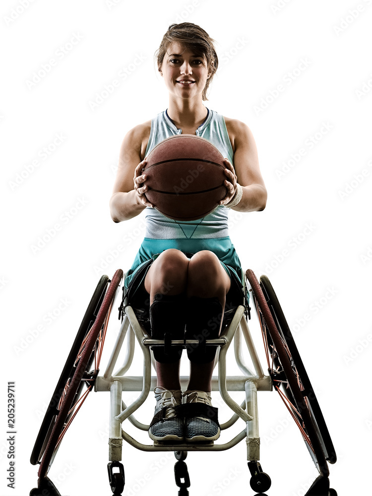 Fototapeta premium one caucasian young handicapped basket ball player woman in wheelchair sport tudio in silhouette isolated on white background