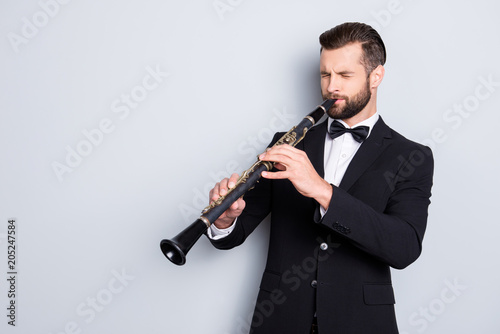 Canvas Print Portrait with copy space, empty place of stylish talented man with hairstyle in