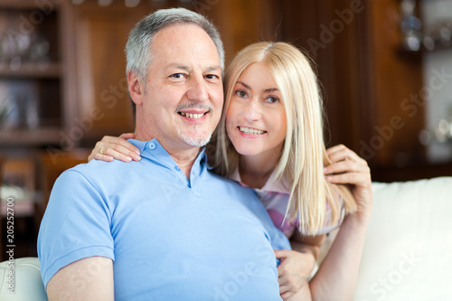 Mature couple relaxing at home