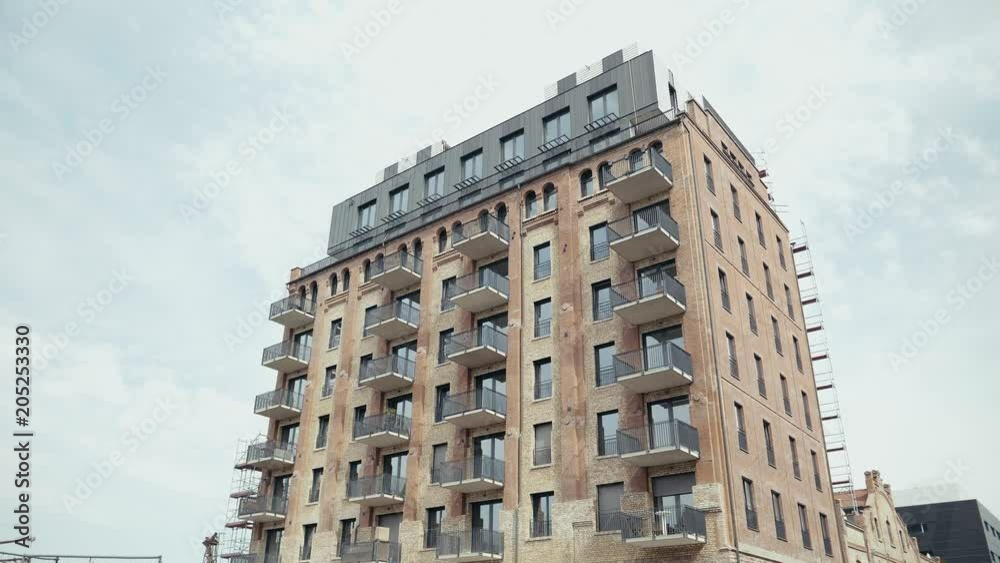 Apartment building establishing shot at day 4K Apartment building establishing shot at day 4K