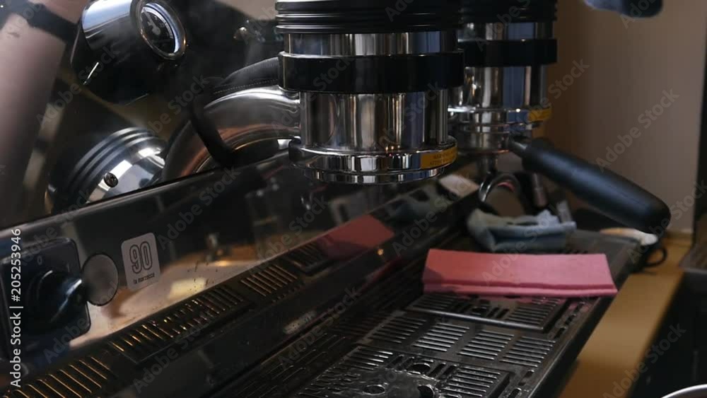 Bartender preparing a Cup of Coffee Espresso