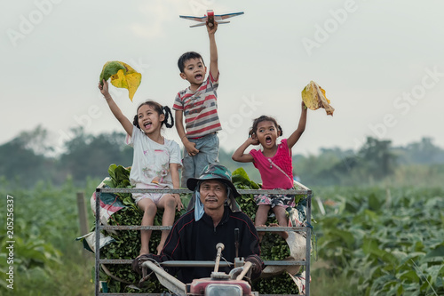 Photography Lifestyle of a farmer family at tabacco farmland of thailand.