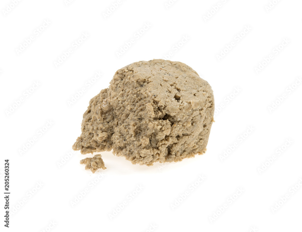a piece of halva on a white background a piece of halva on a white background