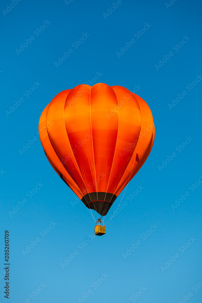 Naklejka premium Colorful hot air balloon fly over the blue sky
