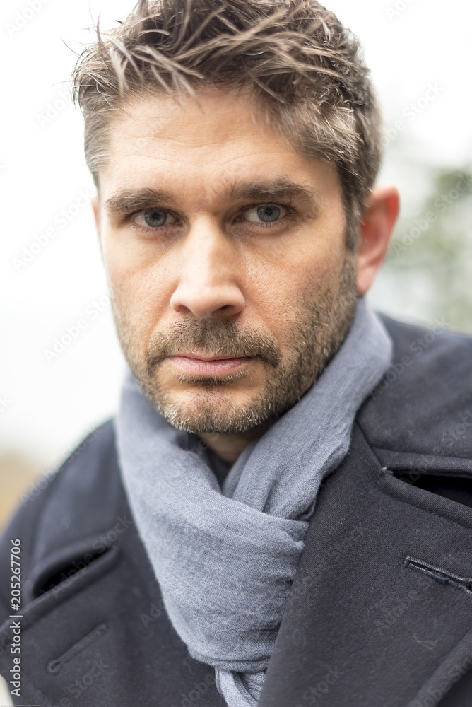 Fototapeta premium Middle Age Man with blue eyes and striking features