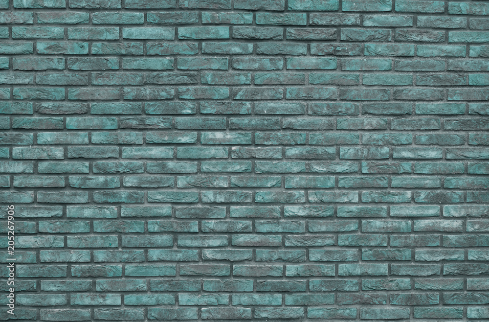 Green brick wall background, wallpaper. Green bricks pattern, texture.