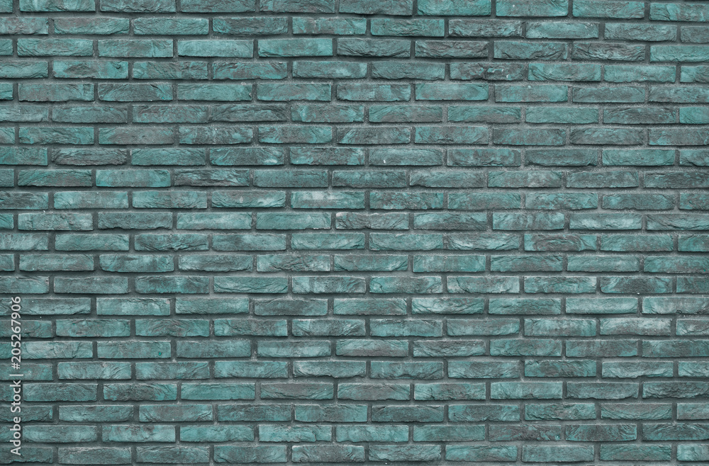 Obraz premium Green brick wall background, wallpaper. Green bricks pattern, texture.