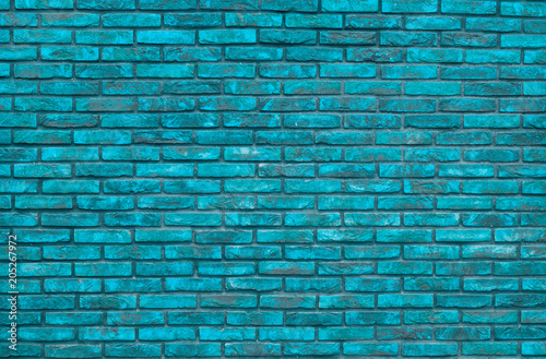 Vibrant blue brick wall background, wallpaper. Blue bricks pattern, texture.